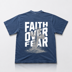 Blue t-shirt with 'Faith Over Fear' text and cross graphic on a white background