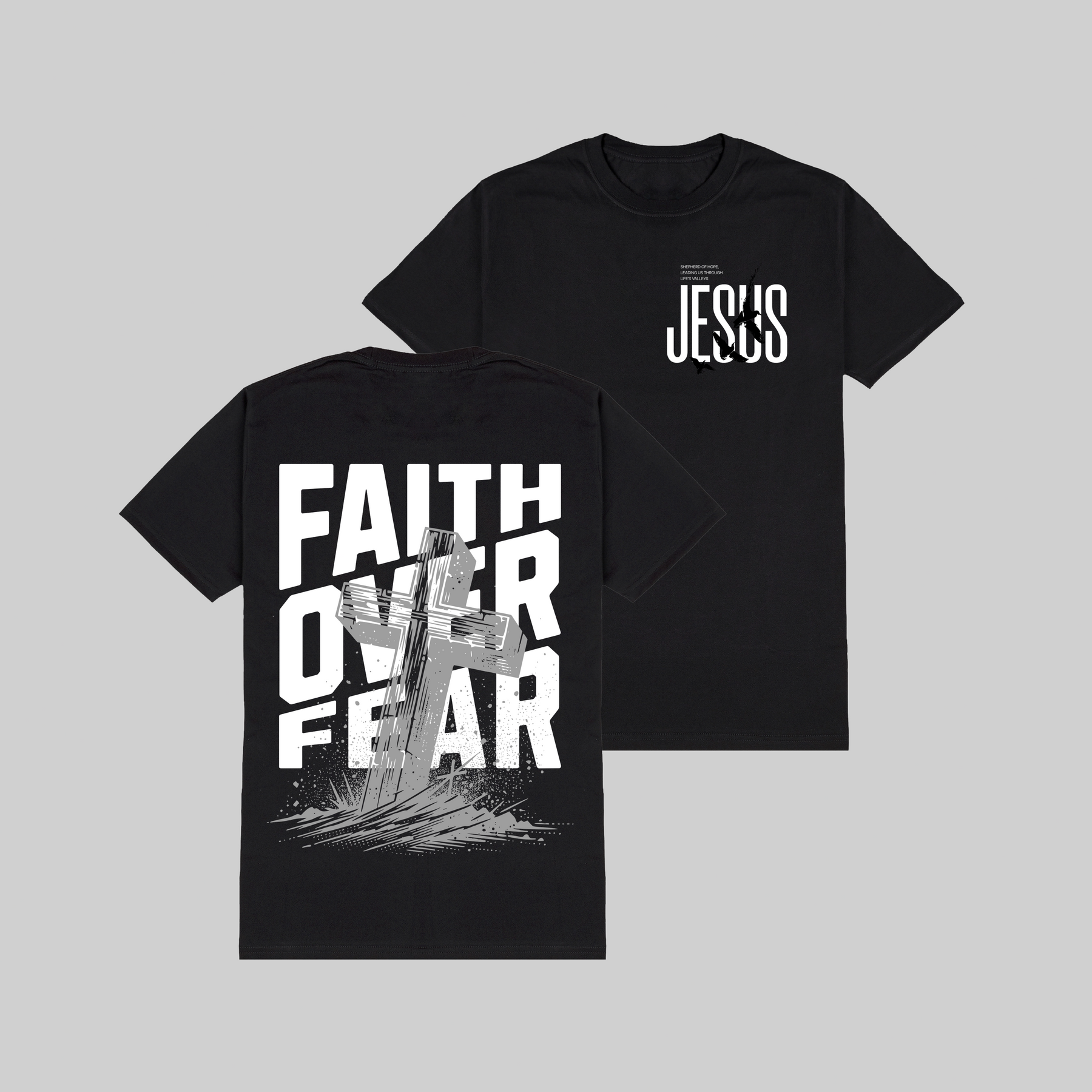 Two black t-shirts with 'Faith Over Fear' and 'Jesus' printed on them against a gray background.