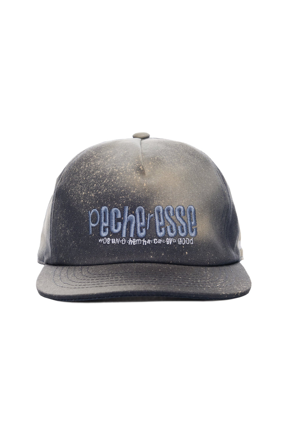 Worn black cap with visible text on a white background